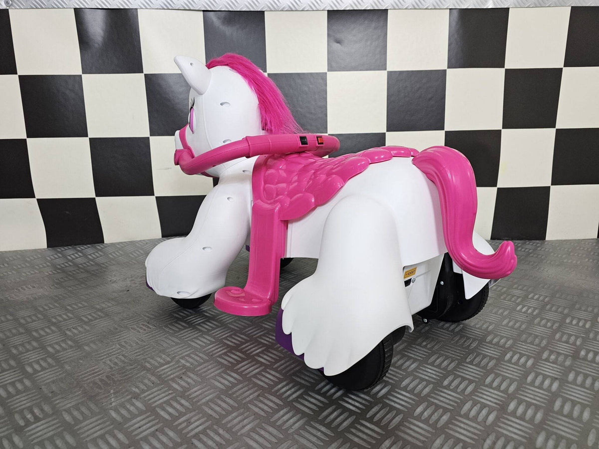 Cavallo elettrico per bambini a forma di unicorno bianco con criniera rosa, dettagli colorati, sedile rosa e luci LED, giochi e divertimento