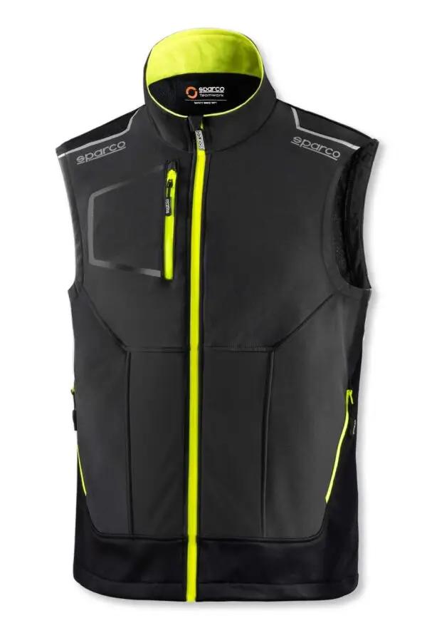 Gilet Tecnico Sparco Illinois nero con inserti rinforzati anti abrasione e dettagli riflettenti, chiusura zip gialla fluorescente.