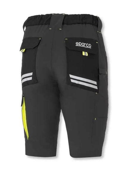 Retro del Bermuda Sparco Laredo nero con dettagli giallo fluo, tasche posteriori con dettagli riflettenti e design ergonomico.