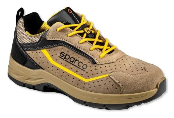 Scarpa Antinfortunistica S1P Colton Sparco in pelle scamosciata beige traforata con dettagli gialli e lacci coordinati. Design robusto e moderno per la sicurezza sul lavoro.