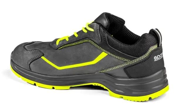 Scarpa da lavoro Sparco con rinforzi in microfibra, lacci gialli e suola in poliuretano antiscivolo, vista posteriore e laterale.