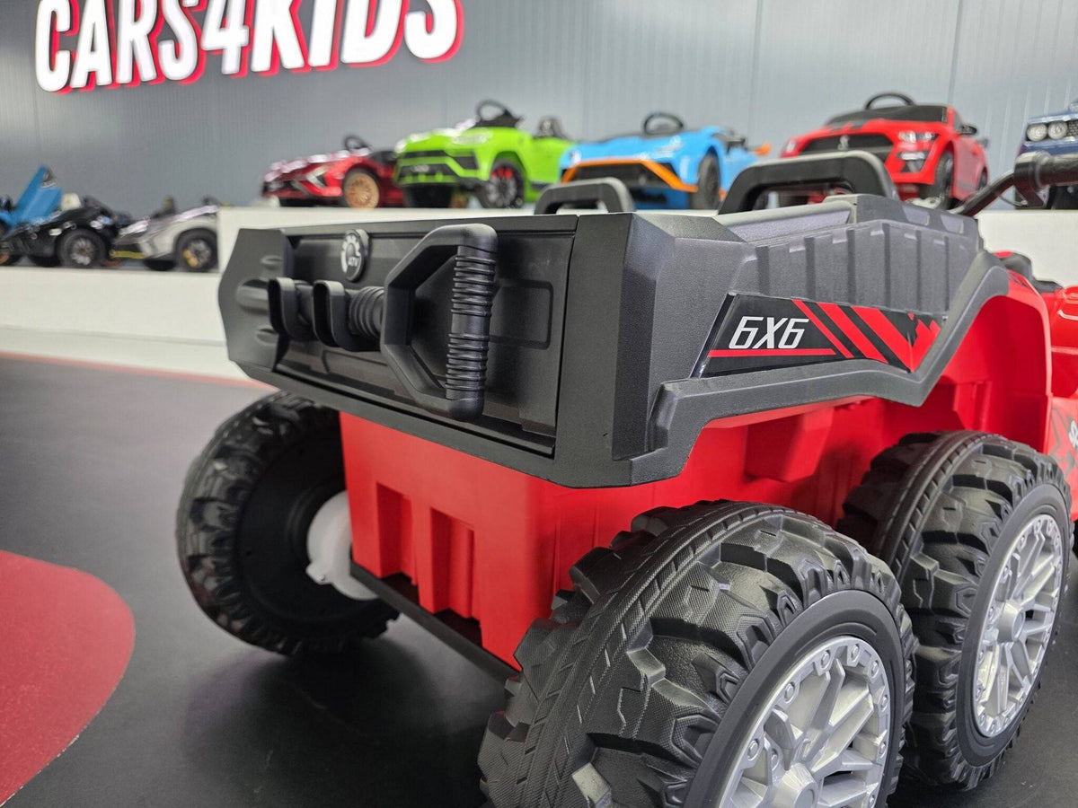 Quad elettrico per bambini rosso con volante e pannello di controllo, sedile imbottito e design resistente, perfetto per giochi all'aperto