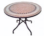 Tavolo in ferro battuto con mosaico tondo Ø100 cm, design elegante per esterni. Ideale per giardini, terrazze o bistrot all'aperto.