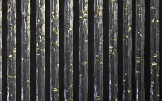 Tenda glitter 100x220 in PVC trasparente con glitter oro, ideale per protezione da insetti e raggi UV. Profilo superiore con occhioli regolabili.