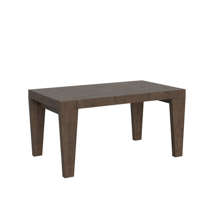Tavolo allungabile Spimbo noce scuro in soggiorno elegante, completamente esteso per ospitare numerosi ospiti.