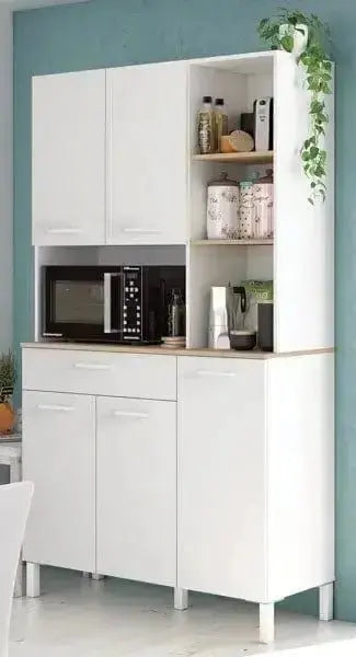 Armadio da cucina bianco Artik/Canadian con 5 ante, 1 cassetto e 3 ripiani, posizionato in una cucina moderna con microonde e decorazioni.