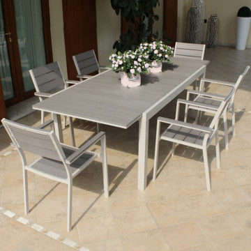 Set da pranzo da esterno con sei poltrone Cervia e tavolo in alluminio tortora e Polywood grigio scuro, perfetto per terrazze.