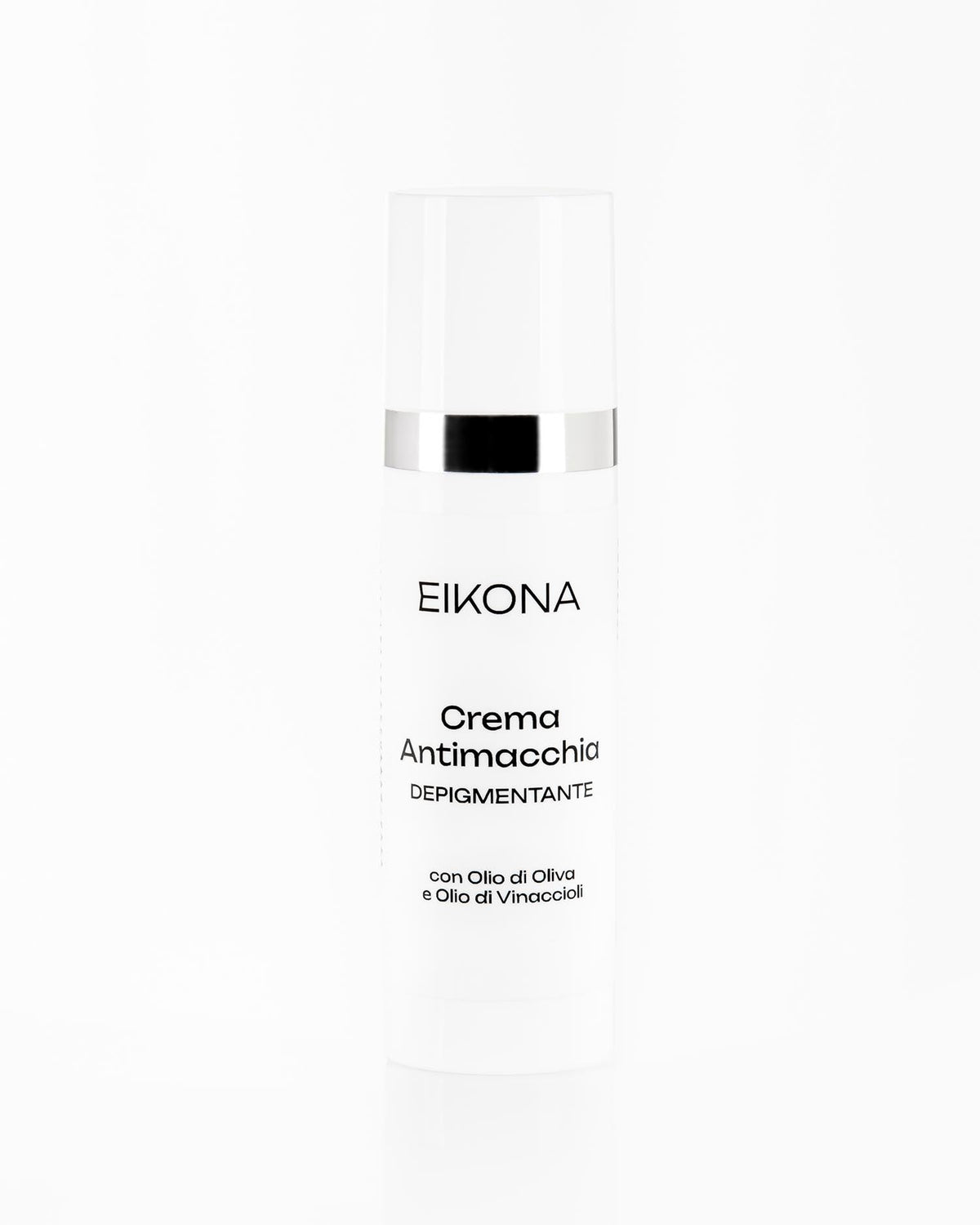 Dettaglio della confezione di crema depigmentante Eikona, con tappo bianco e dettagli neri, sfondo bianco pulito, focus sul prodotto