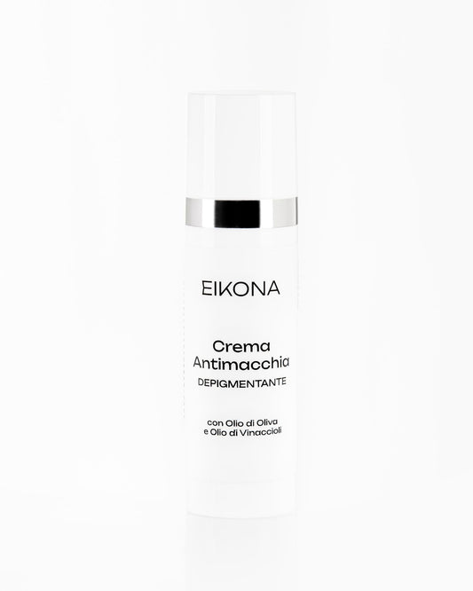 Dettaglio della confezione di crema depigmentante Eikona, con tappo bianco e dettagli neri, sfondo bianco pulito, focus sul prodotto
