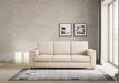 Divano Marrak 3 posti beige in soggiorno moderno, perfetto per creare un ambiente accogliente e raffinato