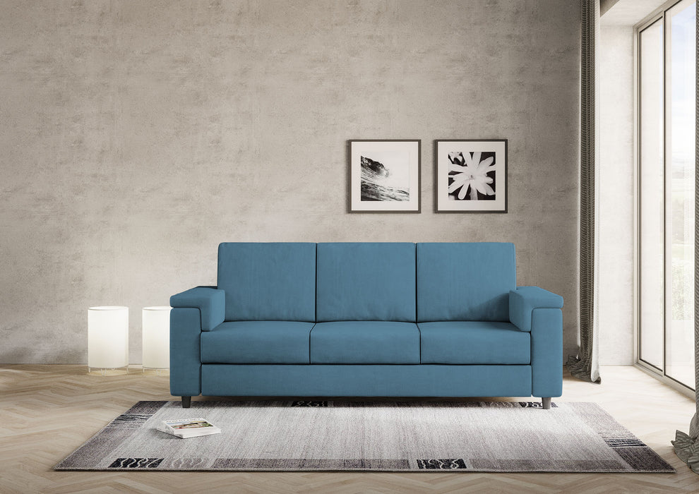 Divano Marrak 3 posti blu in salotto moderno, perfetto per arredare con stile e comfort ambienti contemporanei