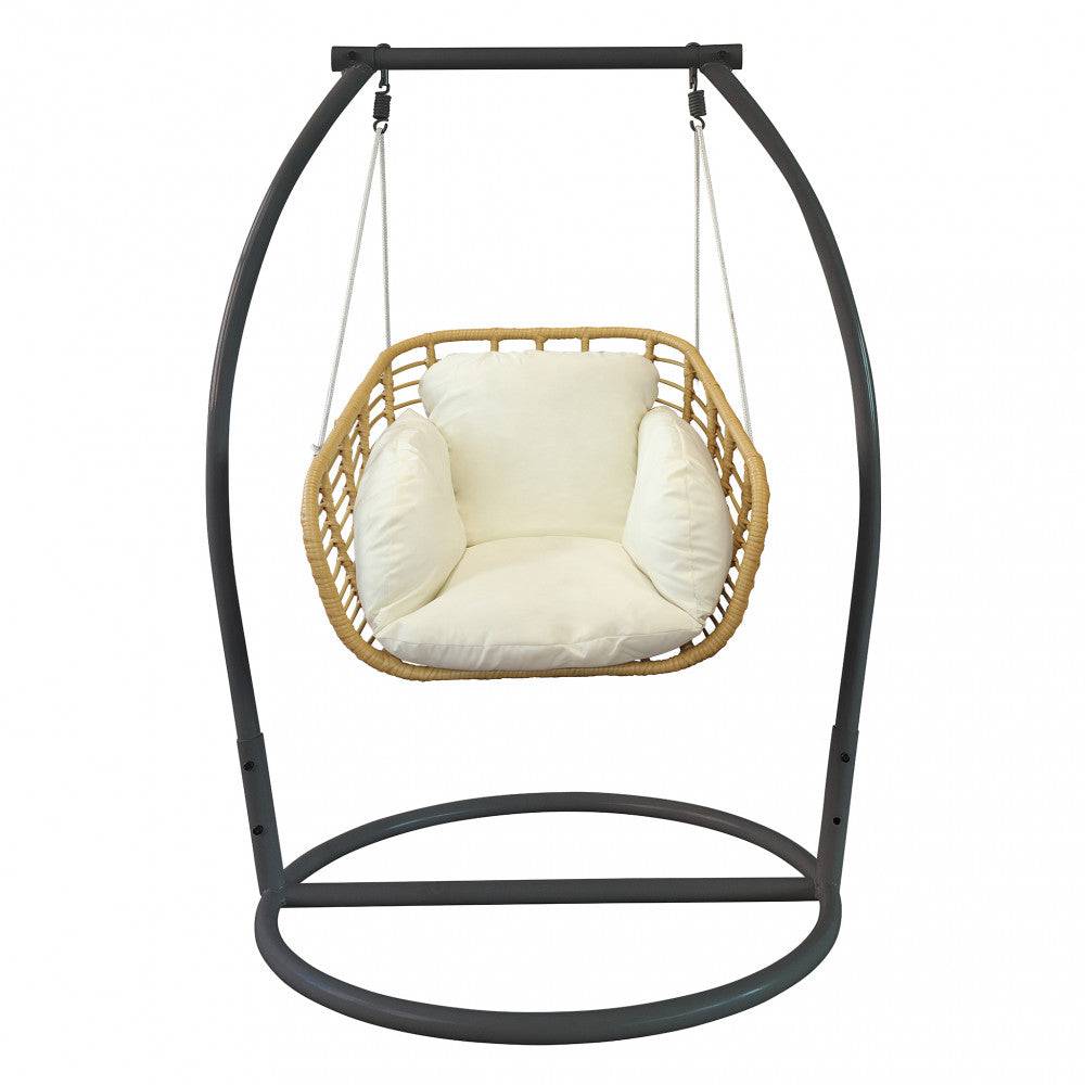 Dondolo Glasgow 1 Posto in metallo nero con seduta a nido in rattan naturale e cuscini bianchi, ideale per relax all'aperto