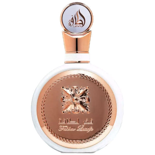 Profumo femminile Fakhar Lattafa Eau de Parfum in bottiglia rotonda con dettagli oro rosa, decorata con fiore e logo Lattafa, elegante e raffinato