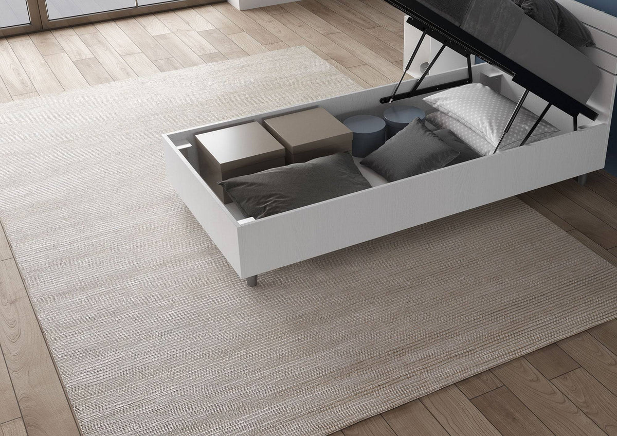 Letto singolo bianco Nuamo 80x200 con contenitore aperto, ideale per riporre cuscini, scatole e altri oggetti.