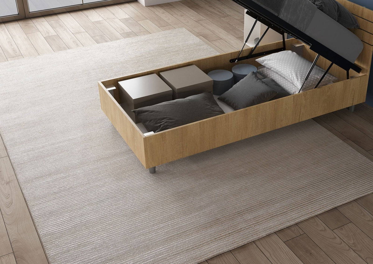 Letto singolo Ankel effetto legno chiaro con contenitore aperto, perfetto per riporre oggetti e mantenere ordine.