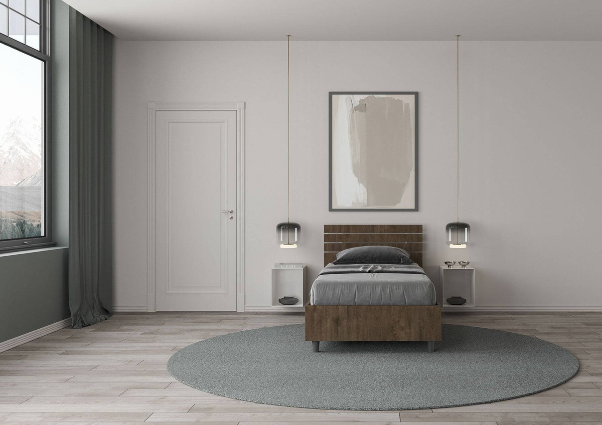 Letto singolo Ankel effetto legno scuro in una camera luminosa con arredamento contemporaneo e dettagli eleganti.