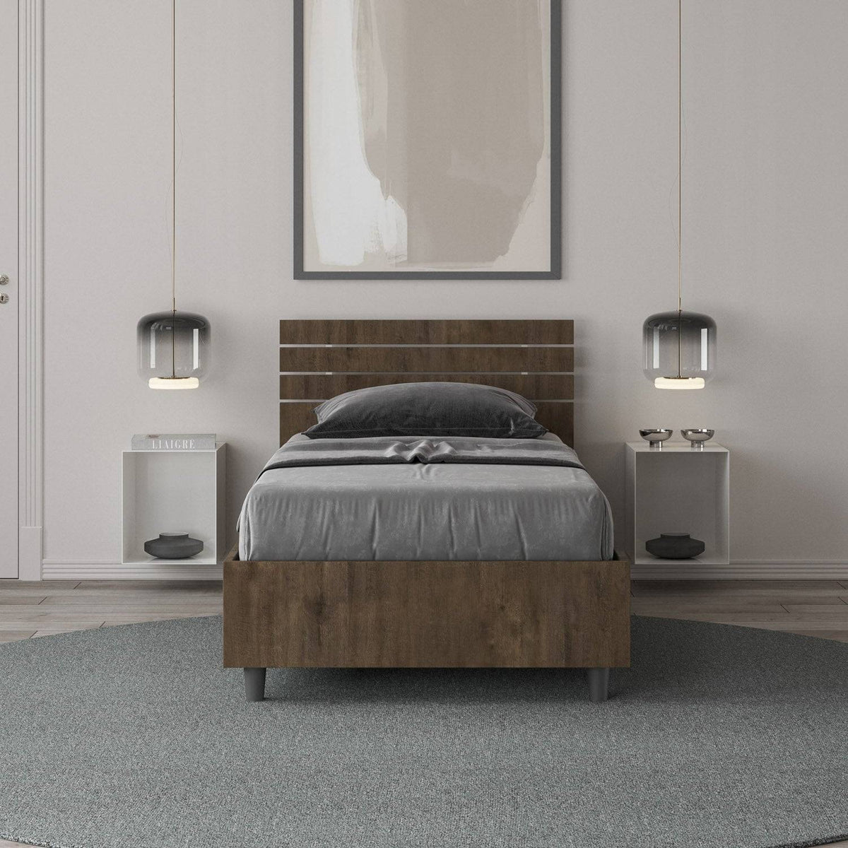 Letto singolo Ankel effetto legno scuro in una camera moderna, con testiera a doghe e arredamento minimalista.