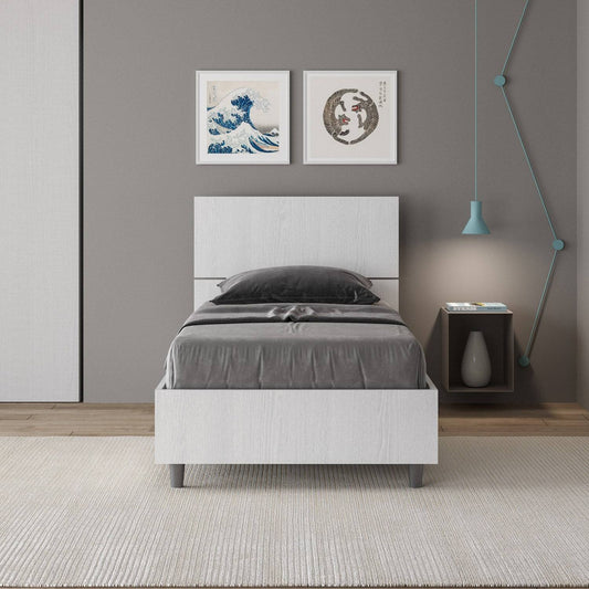 Letto singolo Demas 80x200 bianco con testata inclinata in una camera moderna. Arredo funzionale e compatto per ambienti contemporanei ITYHOME.