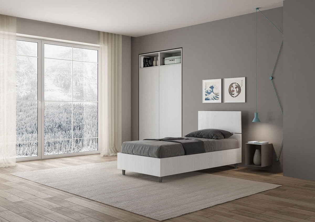 Camera moderna con letto singolo 80x200 Demas bianco, testata dritta e opzione contenitore, perfetto per spazi funzionali e raffinati.