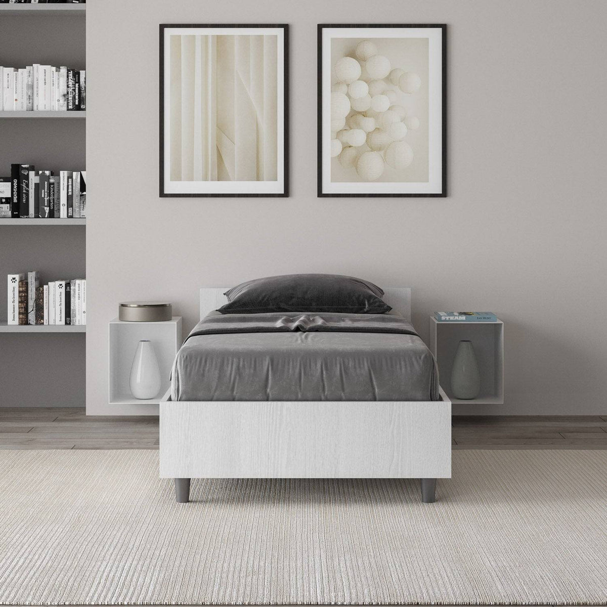 Letto singolo 80x200 Nuamo bianco in una camera moderna, abbinato a comodini sospesi e decorazioni minimaliste.