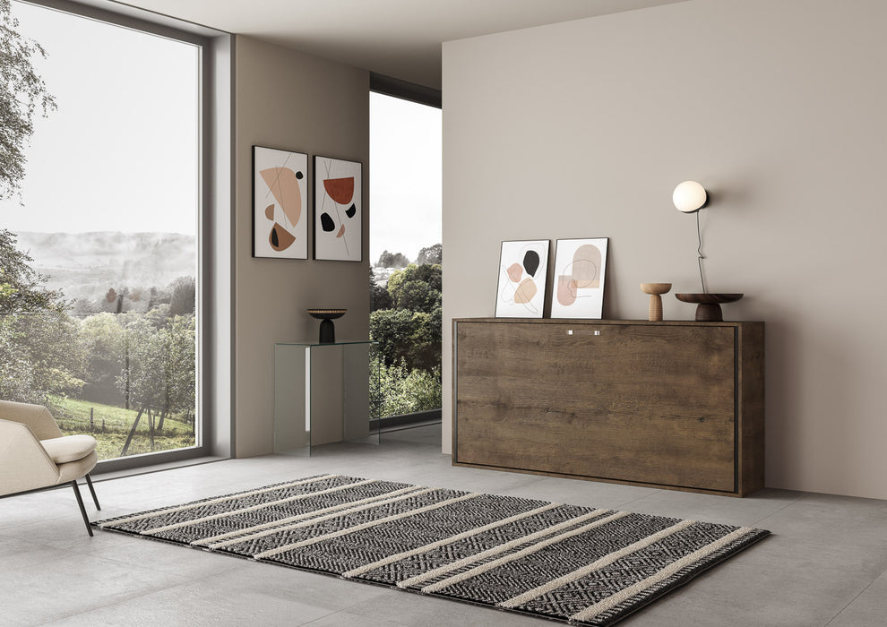 Letto a scomparsa Kando chiuso in finitura legno scuro, arredo compatto e raffinato per ambienti multifunzionali.