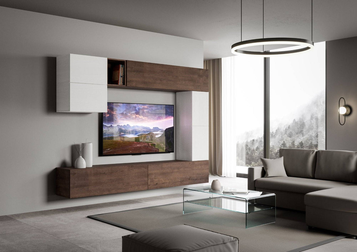 Parete attrezzata Isoka A15 installata in soggiorno moderno, design minimal con pensili bianchi e legno, ideale per arredamento contemporaneo.