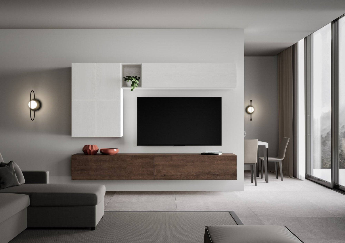 Parete attrezzata Isoka A16 L.268 P.39,2 installata in soggiorno moderno, perfetta per organizzare TV, libri e oggetti decorativi con eleganza.