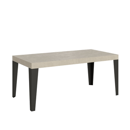 Tavolo Allungabile Flame con Gambe Antracite - Eleganza Italiana, in sala da pranzo con parete in mattoni bianchi e tappeto beige.