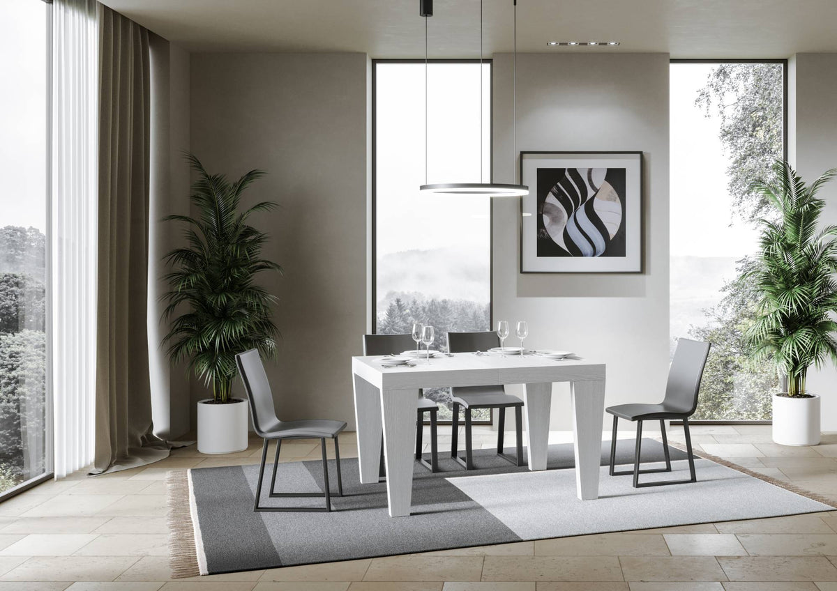 Tavolo allungabile Spimbo bianco frassino in soggiorno elegante, perfetto per cene in famiglia o con amici.