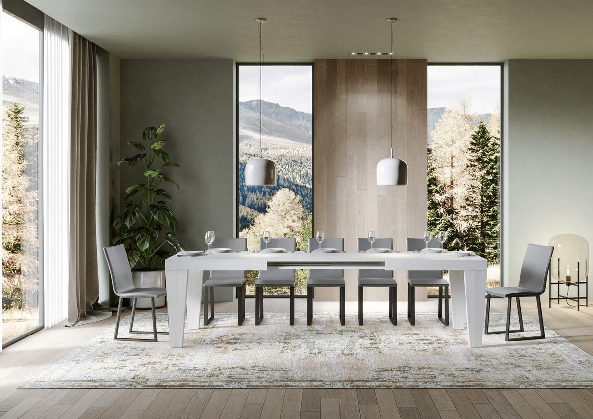 Tavolo allungabile Spimbo cemento chiaro in soggiorno elegante, ideale per ambienti moderni e spaziosi.