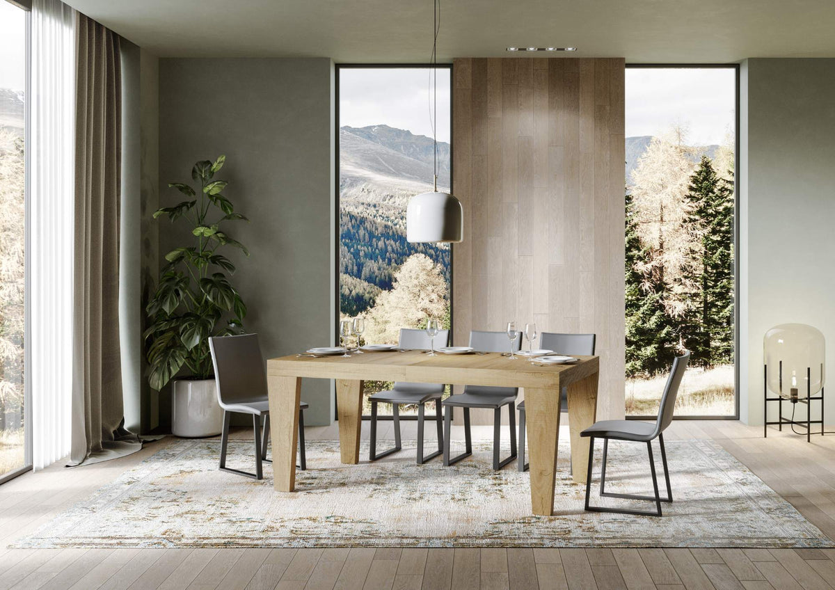 Tavolo allungabile Spimbo cemento chiaro, versione extra large. Ideale per ospitare fino a 14 persone in ambienti moderni.
