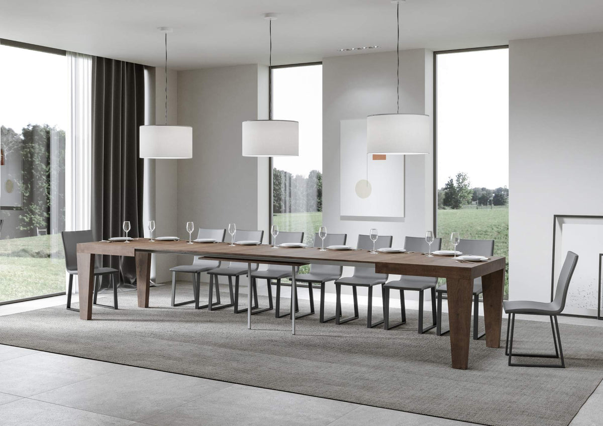Tavolo allungabile Spimbo noce scuro in versione maxi, ideale per ospitare numerosi ospiti con eleganza.