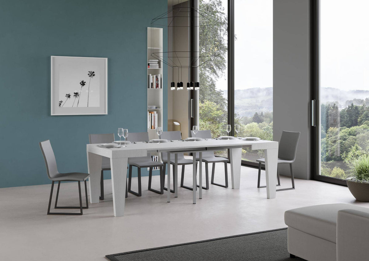 Tavolo allungabile Spimbo bianco frassino completamente esteso, perfetto per ospitare più persone in ambienti eleganti e funzionali.