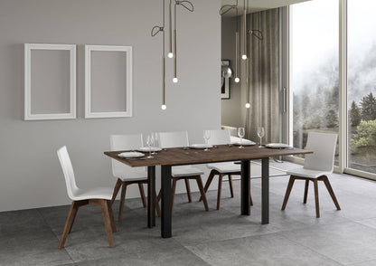 Tavolo Linea Double esteso marrone con sedie