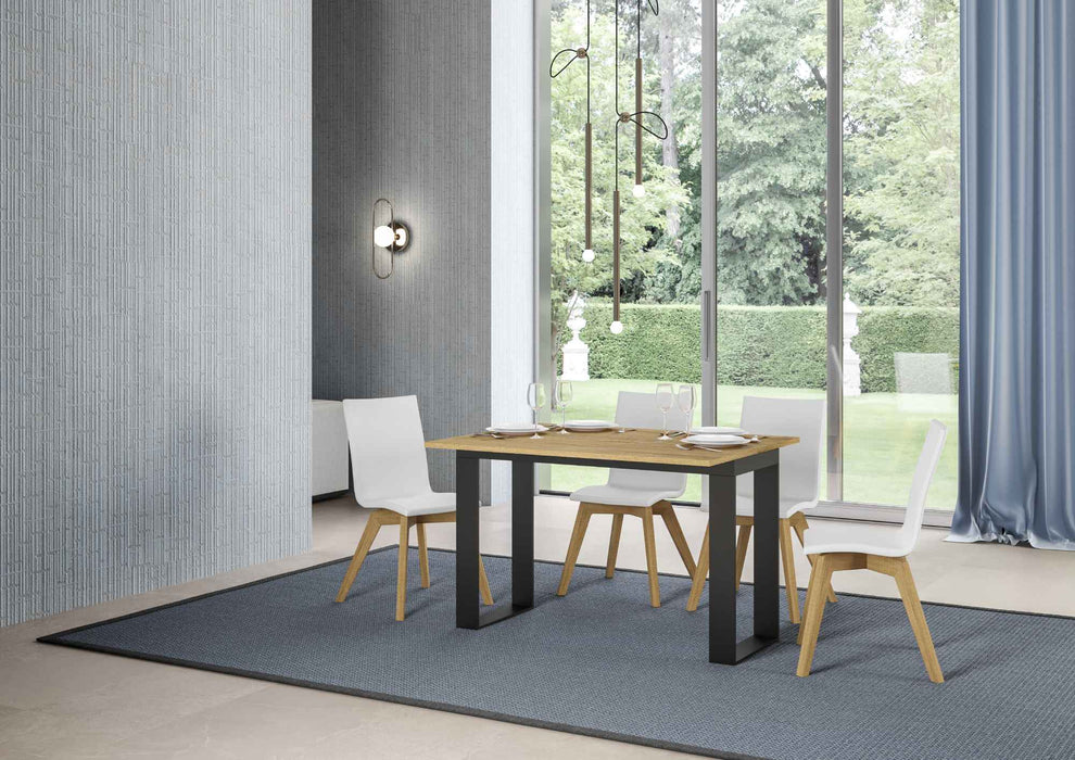 Tavolo Tecno Double aperto con rifinitura legno chiaro