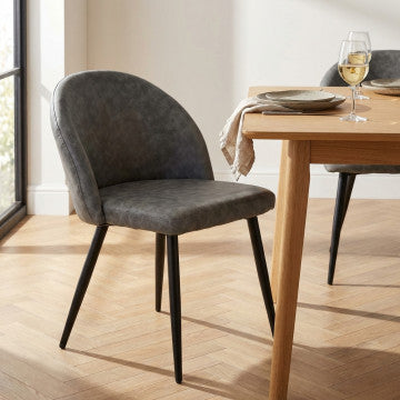Poltrona struttura metallo seduta schienale ecopelle grigia 50x50x76