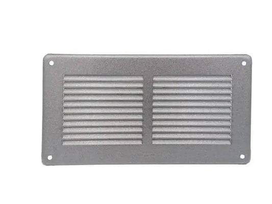 Griglia sovrapporre mm240x140 AL/Z rettangolare in Aluzink con alette inclinate e rete, ideale per ventilazione e riscaldamento.